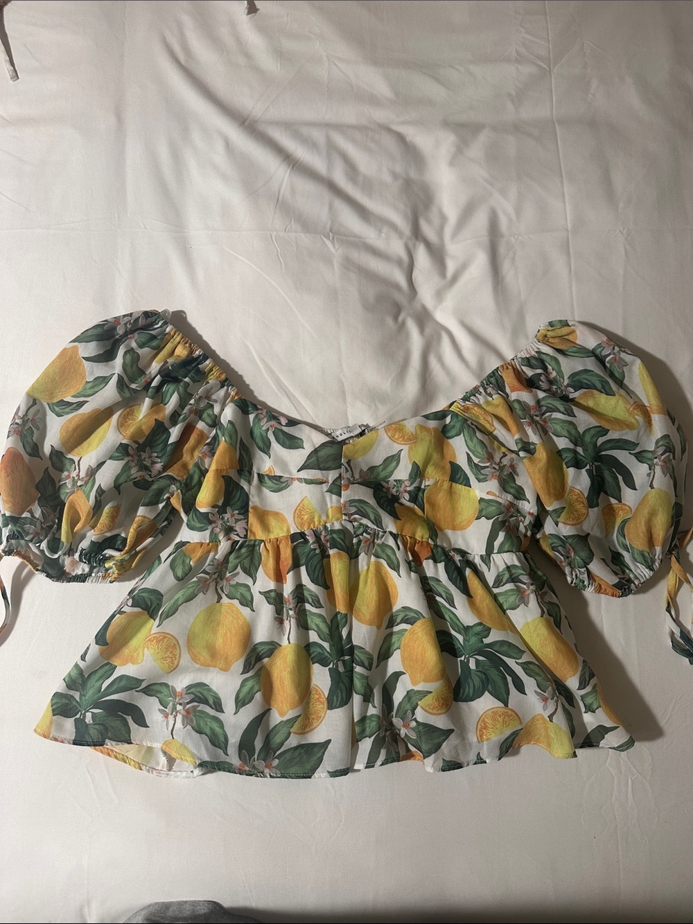 Women’s boutique lemon puff sleeve top blouse